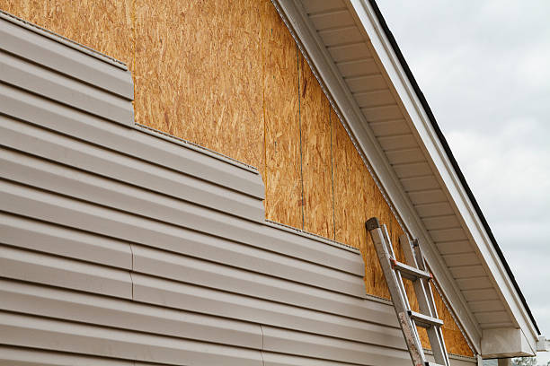 Professional Emergency Siding Repair technician working in Upper Sandusky, OH